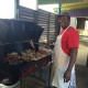 jerk master peter grilling the best barbeque at trellis bay full moon party