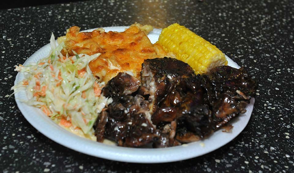 delicious plate of bbq chicken , macaroni pic, corn on the cob and coleslaw available every weekend at trellis bay market