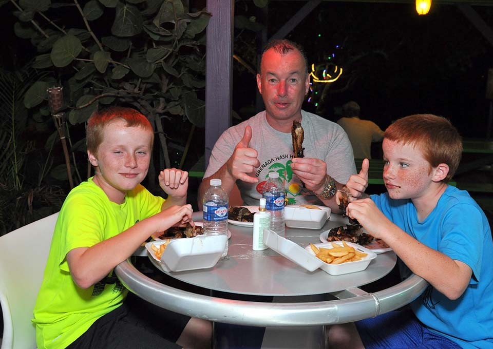 awesome customers enjoying their bbq meal at trellis bay market