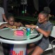 kids enjoying their bbq meal at trellis bay market british virgin islands