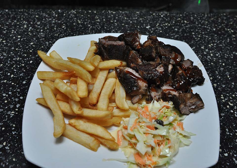 tasty jerk pork plate at trellis bay market