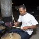 drummer performing arm band singing away outdoor chill at trellis bay market
