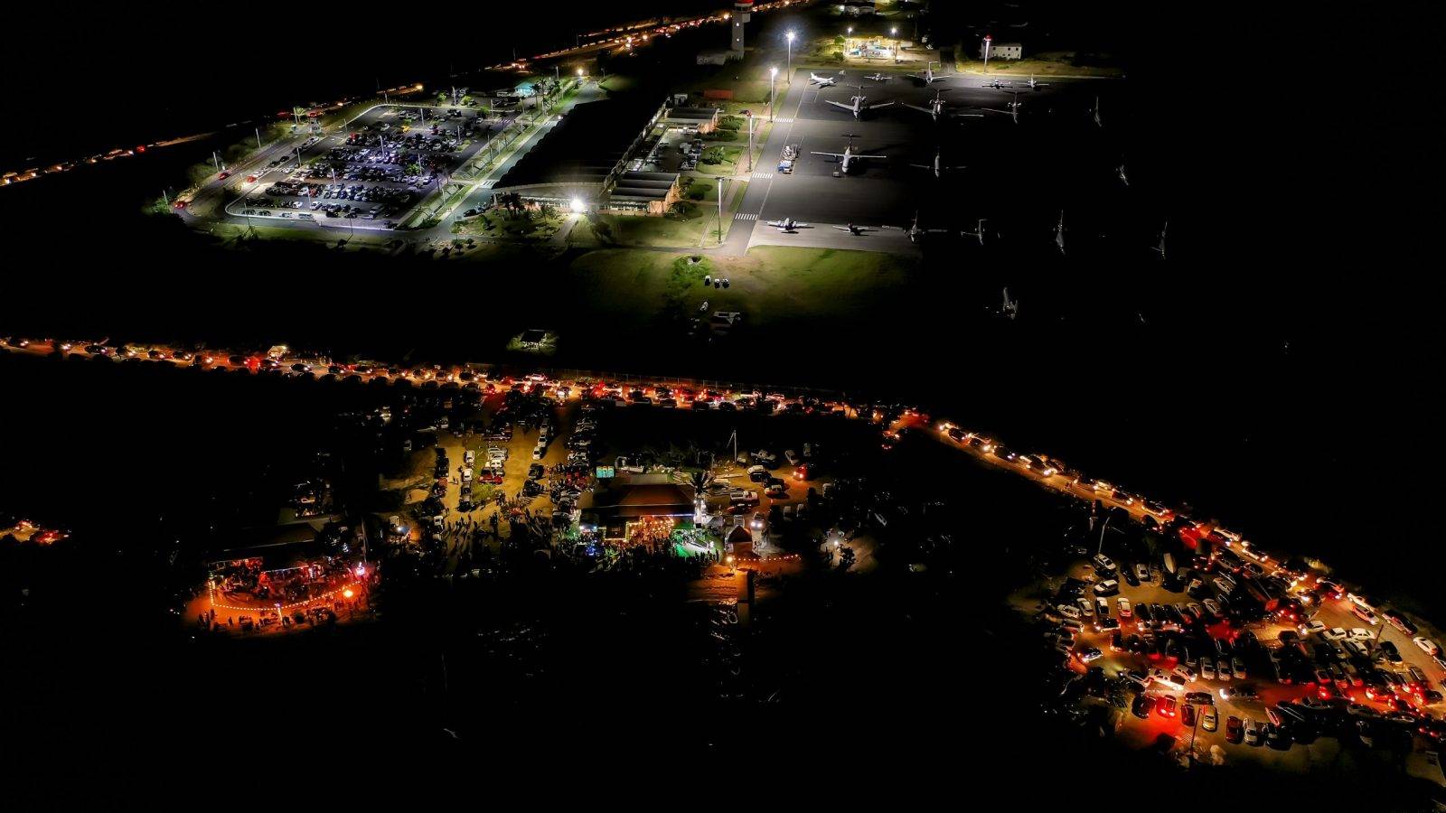 An aerial view of the surrounding area at night
