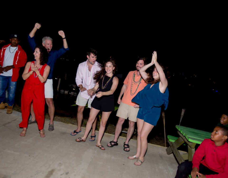 People dancing and clapping hands