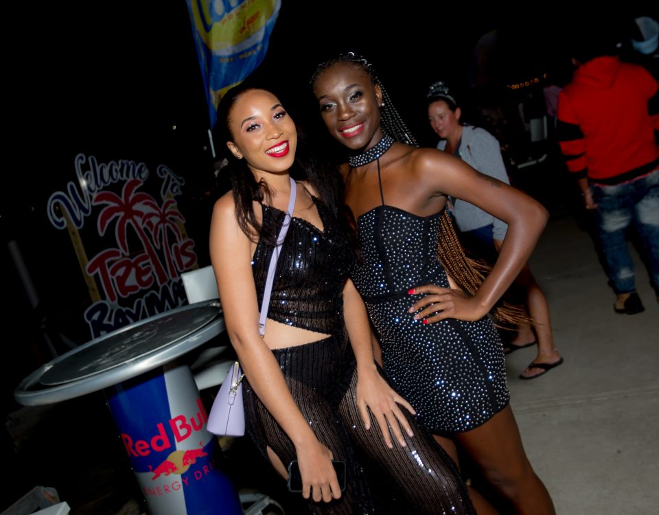 Two women in their black party outfit