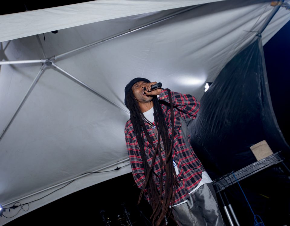 A singer on stage with a microphone