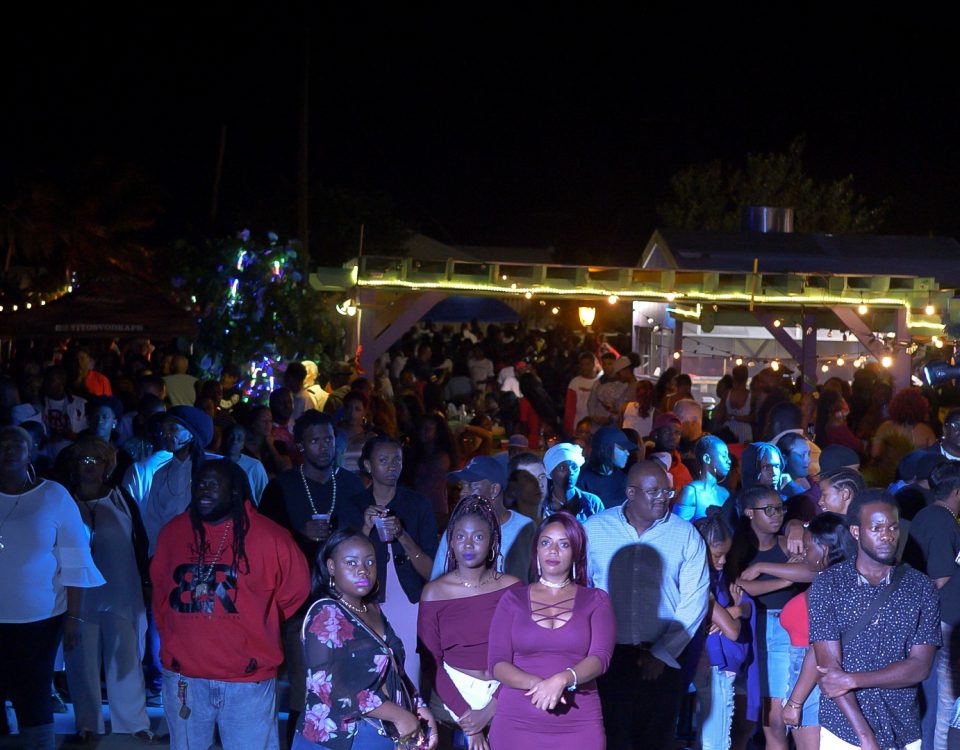 People standing under blue light