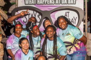 Group of people smiling at a party.