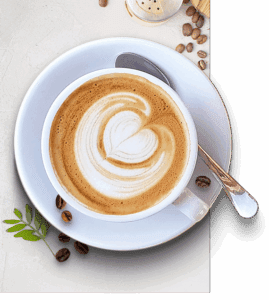 Latte with heart-shaped foam art design.